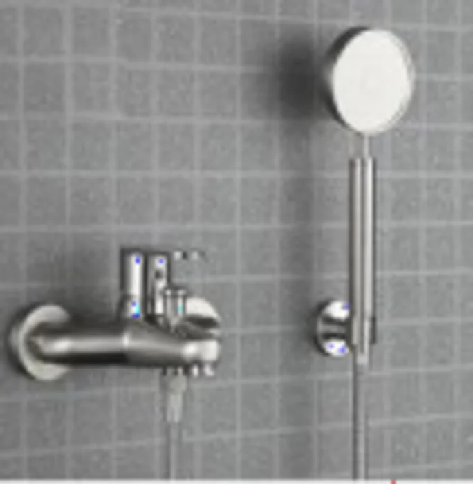 Bath or shower fitting